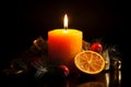 Warm burning candle with winter holiday decoration. Generate ai Royalty Free Stock Photo