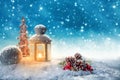 Warm candle light in a snowy winter landscape Royalty Free Stock Photo