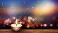 Warm candle on wooden floor bokeh lights background