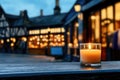 Warm candlelight on rustic village street at dusk Royalty Free Stock Photo