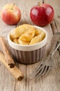 Warm cinnamon apple slices in a bowl