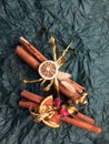 Warm cinnamon sticks wrapped in ribbon for Christmas Royalty Free Stock Photo