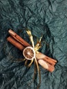 Warm cinnamon sticks wrapped in ribbon for Christmas