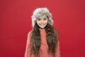 Warm clothes and accessory tips. happy little girl in earflap hat. holiday activity outdoor. small child ready for