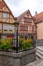 Warm colored typical German wood framed houses and little fence