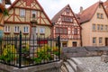 Warm colored typical German wood framed houses and little fence