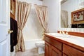 Warm cozy bathroom with curtains