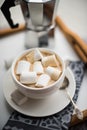 Warm cozy home. Tray and cup of coffee with marshmallows Royalty Free Stock Photo