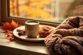 warm cozy window arrangement, autumn concept, coffe, spices throw leaves