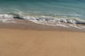 Warm day on a Cannes beach with azure waves of mediterranean sea