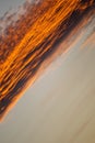 Warm diagonal golden orange clouds during sunset Royalty Free Stock Photo