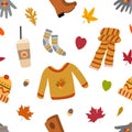 Warm fall clothes vector seamless pattern with sweater, scarf, hat, boots, coffee, gloves. Isolated on white background. Royalty Free Stock Photo