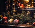 a warm and festive Christmas decoration featuring ornaments, candles, and a tree on a wooden mantle Royalty Free Stock Photo