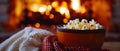 Warm Fireside Bliss: Snuggles & Popcorn Delight. Concept Cozy Night In, Fireside Snuggles, Movie Royalty Free Stock Photo