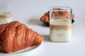 Warm Fresh Buttery Croissants with coffee for breakfast. French and American Croissants and Baked Pastries. Royalty Free Stock Photo