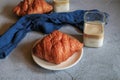 Warm Fresh Buttery Croissants with coffee for breakfast. French and American Croissants and Baked Pastries. Royalty Free Stock Photo