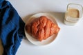 Warm Fresh Buttery Croissants with coffee for breakfast. French and American Croissants and Baked Pastries. Royalty Free Stock Photo