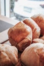 Warm Fresh Buttery Croissants and Rolls. French and American Croissants and Baked Pastries Royalty Free Stock Photo