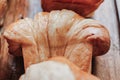 Warm Fresh Buttery Croissants and Rolls. French and American Croissants and Baked Pastries Royalty Free Stock Photo