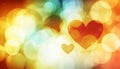 Warm Glittery Gradient Out Of Focus Bokeh Background With Soft Hearts And Plenty Of Copy Space. Royalty Free Stock Photo
