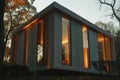 warm glow from windows of a cubeshaped modern home