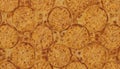 Warm, golden brown crumpets with a repeating circular pattern. Textured surface with small bubbles, resembling a close-up of Royalty Free Stock Photo