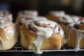 warm, gooey cinnamon buns with icing drizzle