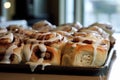 warm, gooey cinnamon buns with icing drizzle