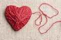 Warm heart made of red wool yarn Royalty Free Stock Photo