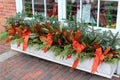 Brick walkway with window box filled with Christmas cheer, downtown Portsmouth, new Hampshire, 2018