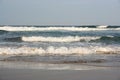 Warm Indian Ocean waves breaking on the beach