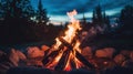 Campfire Burns in a Rock Circle at Dusk in a Forest Royalty Free Stock Photo