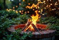 Cozy campfire surrounded by greenery and twinkling lights at night Royalty Free Stock Photo