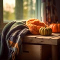 Cozy Fall Blanket and Pumpkins on Wooden Background