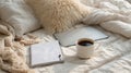 Cozy Workspace Setup With Coffee and a Journal on a Soft Bed During a Peaceful Morning Royalty Free Stock Photo