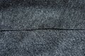 Warm jacket sleeve wool fabric texture background close-up. Royalty Free Stock Photo