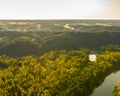 Warm morning aerial top view of river valley forest in northern europe national park Royalty Free Stock Photo