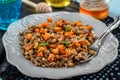 Warm lentil salad with baked pumpkin and mint