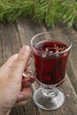 Warm mulled wine in male hands