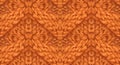 Warm orange knitted wool pattern texture for cozy winter background Royalty Free Stock Photo