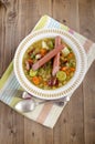 Warm pea soup with sausages