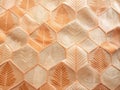 Warm Peach Fabric Design with Interlocking Geometric Patterns and Leaves A Textured Gradient Spotlight Royalty Free Stock Photo