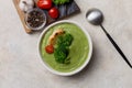 Warm puree soup with broccoli, parsley and cherry tomatoes Royalty Free Stock Photo