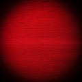 Warm red textured background with sharp vignette