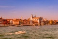 Warm reddish sunset over amazing Venetian Grand Channel, Venice, Italy, summer time Royalty Free Stock Photo