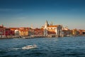 Warm reddish sunset over amazing Venetian Grand Channel, Venice, Italy, summer time Royalty Free Stock Photo