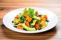 warm roasted butternut squash salad, avocado slices, black beans