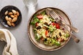 Warm salad with bulgur, vegetables and leaves Royalty Free Stock Photo