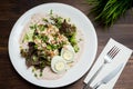 Warm salad with chicken and bage sauce