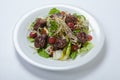 Warm salad with chicken liver and grapes